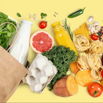 Grocery shopping concept - foods with shopping bag